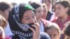 FILE - Yazidi women wait in a refugee camp in Diyarbakir, Turkey. Rights activists fear female captives of the Islamic State group may face further trauma in efforts to liberate Mosul, Iraq.