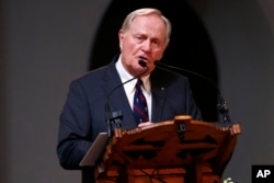 Golfer Jack Nicklaus makes remarks during a memorial service for golfer Arnold Palmer in the Basilica at St. Vincent's College in Latrobe, Pennsylvania, Oct. 4, 2016.