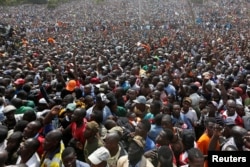 Supporters of Kenyan opposition leader Raila Odinga of the National Super Alliance (NASA) coalition gather during Odinga's swearing-in ceremony as the president of the People's Assembly in Nairobi, Kenya, Jan. 30, 2018.