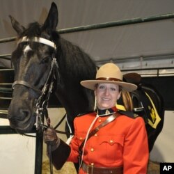 Constable Lynn Willms and her mount Angel are part of the Royal Canadian Mounted Police Musical Ride