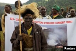 FILE - People from the Sengwer community protest their eviction from their ancestral lands, Embobut Forest, by the government for forest conservation in western Kenya, April 19, 2016.