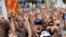 Supporters of leader of The League party Matteo Salvini chant slogans at the party's rally in Pontida, northern Italy, Sept. 15, 2019. 