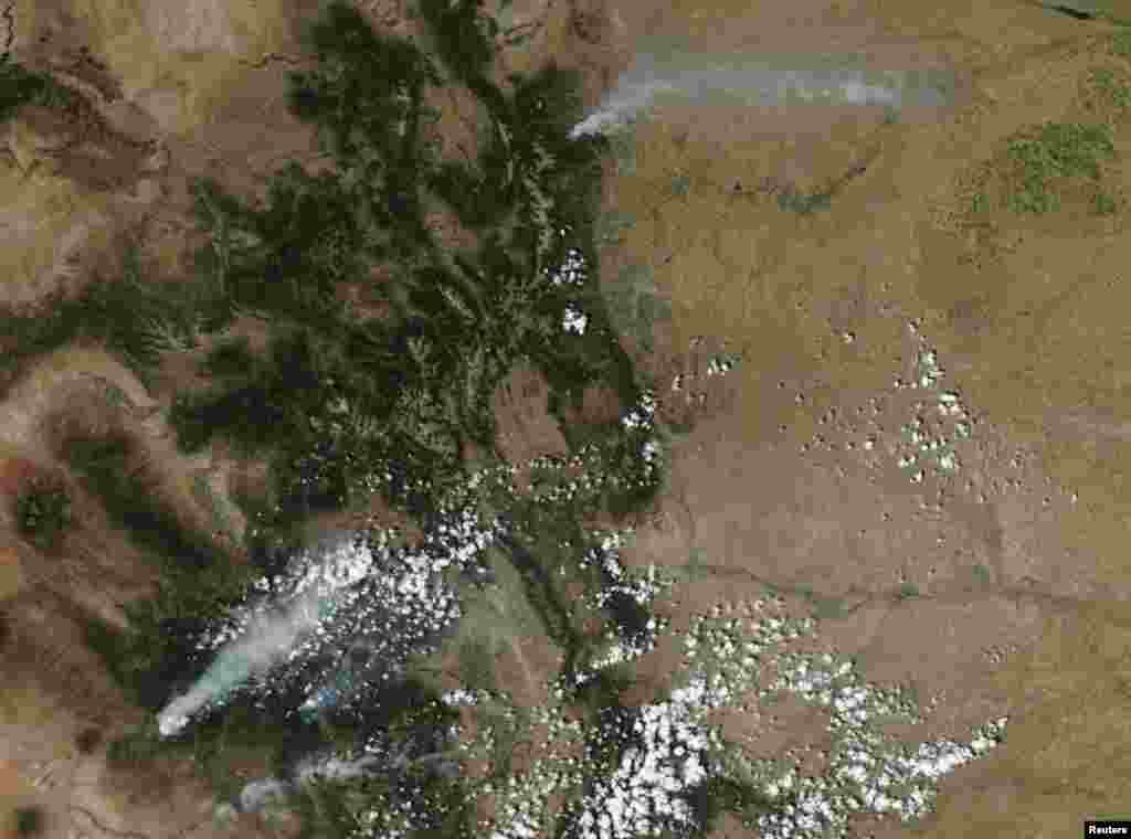 Smoke plumes from wildfires in Colorado are pictured in this satellite image.