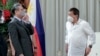 FILE - Philippine President Rodrigo Duterte (R) chats with Chinese Foreign Minister Wang Yi at the Malacanang presidential palace in Manila, Jan. 16, 2021. (Image: Malacanang Presidential Photographers Division)