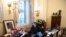 Richard Barnett, a supporter of President Donald Trump sits inside the office of US Speaker of the House Nancy Pelosi as he protests inside the U.S. Capitol in Washington, D.C., Jan. 6, 2021.