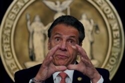FILE - New York Governor Andrew Cuomo gestures during a news conference on the coronavirus disease in New York City, New York, May 3, 2021.