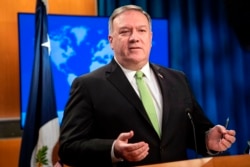 FILE - Secretary of State Mike Pompeo speaks during a press briefing at the State Department in Washington, May 20, 2020.