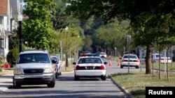 FILE - Police vehicles are seen on an Ohio street