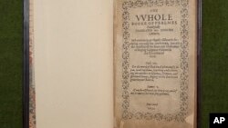 This 2013 photo provided by Old South Church in Boston shows one of two 1640 copies of the Bay Psalm Book belonging to the church, in Boston. 