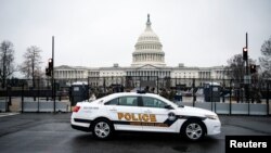 FILE: A U.S. Capitol Police car drives past the U.S. Capitol in Washington, D.C. Taken Jan. 26, 2021. Capitol police are not controlled by any U.S. state.