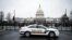 FILE: A U.S. Capitol Police car drives past the U.S. Capitol in Washington, D.C. Taken Jan. 26, 2021. Capitol police are not controlled by any U.S. state.