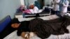 An Afghan woman receives treatment at a hospital after she was injured during an airstrike in Herat province, Afghanistan, Aug. 29, 2017.