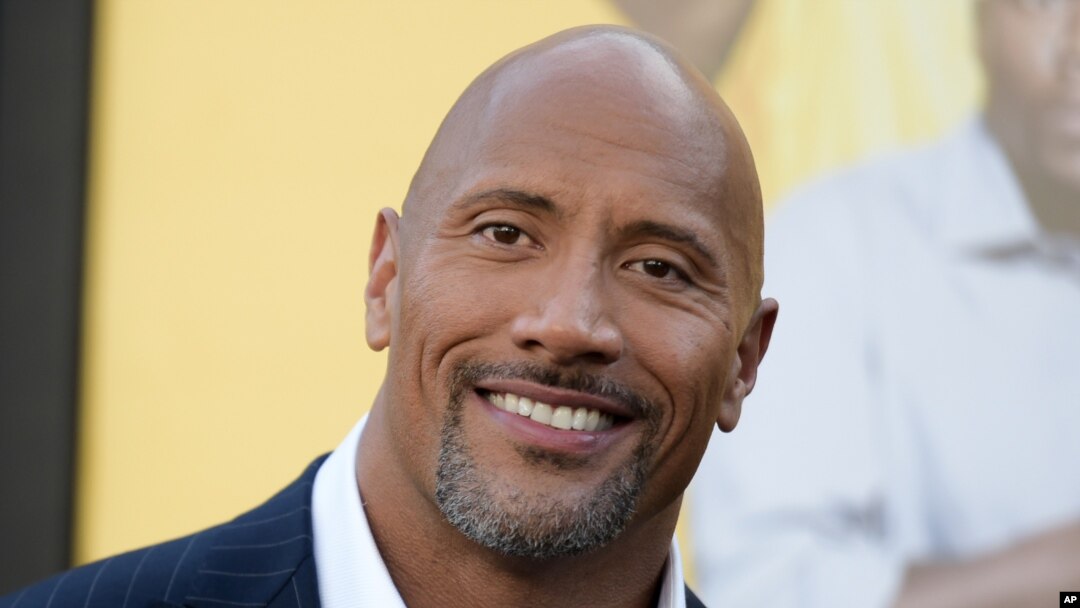 FILE - Actor Dwayne Johnson attends the premiere of his film "Central Intelligence" in Los Angeles, June 10, 2016. Johnson's income has swelled from upfront fees for "Central Intelligence" and "Fast 8," as well as the forthcoming "Baywatch," Forbes magazine said.
