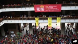 Opponents of the Thirty Meter Telescope rally at the Hawaii state Capitol on Wednesday, Jan. 15, 2020 in Honolulu as lawmakers gathered for the opening day of the state Legislature. 