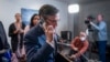 FILE - Speaker of the House Mike Johnson talks on his phone at the Capitol in Washington, Dec. 1, 2023.