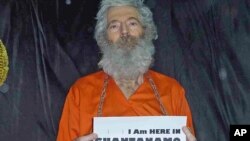 Undated handout photo shows retired FBI agent Robert Levinson. His family received these photographs in April 2011. 