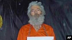 FILE - Undated handout photo shows retired FBI agent Robert Levinson. His family received this photograph in Apr. 2011. 