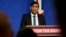 FILE — Britain's Prime Minister Rishi Sunak reacts as he gives a press conference, following the Supreme Court’s Rwanda policy judgement, at Downing Street, in central London, on November 15, 2023.