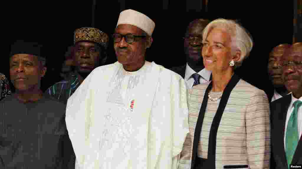 Shugaba Muhammdau Buhari Da Mataimakin Sa Yemi Osinbajo Tare Da Shugabar Hukumar Asusun Bada Lamuni Na Duniya Christine Lagarde A Birnin Abuja Najeriya, Janairu 6, 2016. &nbsp;