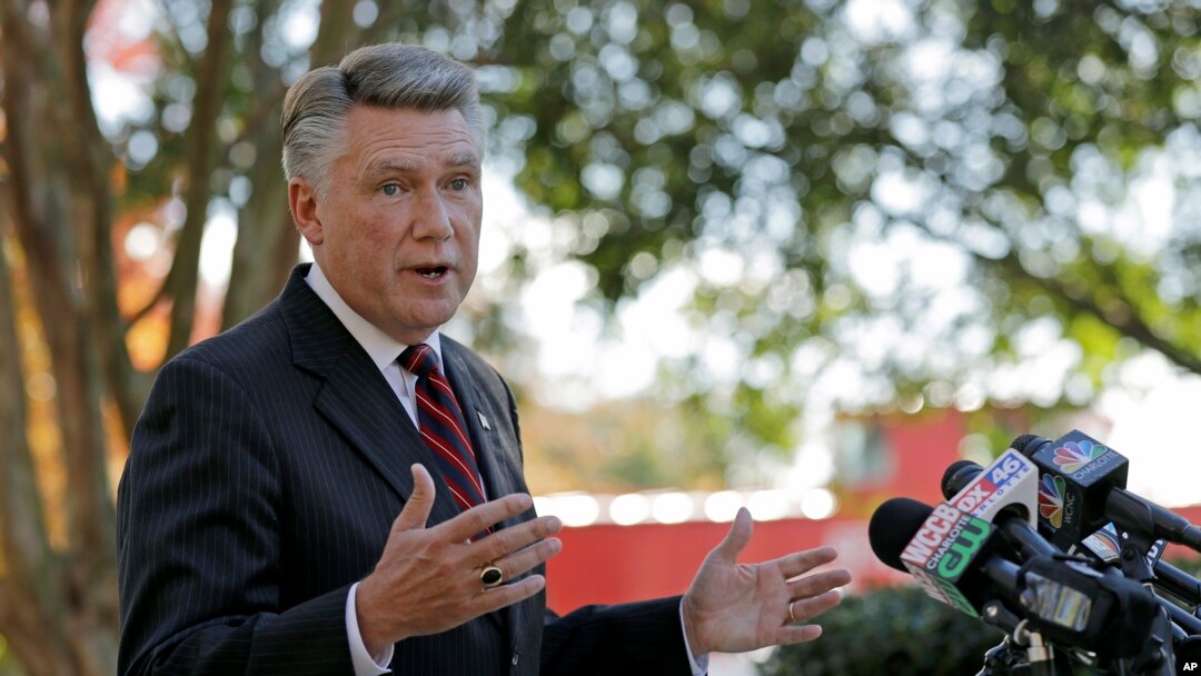 Republican Mark Harris speaks to the media during a news conference in Matthews, N.C., Nov. 7, 2018.