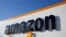 FILE PHOTO: The logo of Amazon is seen at the company logistics center in Boves, France, Aug. 8, 2018.