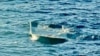 A capsized migrant boat is seen off the island of Gavdos, Greece, Dec. 14, 2024. (Hellenic Coast Guard/Handout via Reuters)