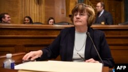 Rachel Mitchell, a prosecutor from Arizona, selected to question Supreme Court nominee Brett Kavanaugh and Christine Blasey Ford, the woman accusing Kavanaugh of sexually assaulting her at a party in the early 1980s, is seen before the U.S. Senate Judicia