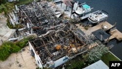 Razrušene kuće u Signal Kovu, na Floridi, posle prolaska uragana Idalija (Foto: Miguel J. Rodriguez Carrillo / AFP)