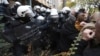 Skirmishes between Serbian police and opposition protesters demanding arrests over a deadly roof collapse at a railway station in Novi Sad, Serbia, Nov. 20, 2024.