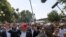 U.S. Republican presidential candidate Donald Trump greets attendees at the Iowa State Fair during a campaign stop in Des Moines, Iowa, United States, Aug. 15, 2015. 
