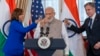 FILE - Vice President Kamala Harris, India's Prime Minister Narendra Modi, and Secretary of State Antony Blinken, share a toast during a State Visit Luncheon at the State Department, June 23, 2023, in Washington.