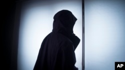 FILE - A gay man from Chechnya who wished to remain anonymous is interviewed by the Associated Press, April 28, 2017. 