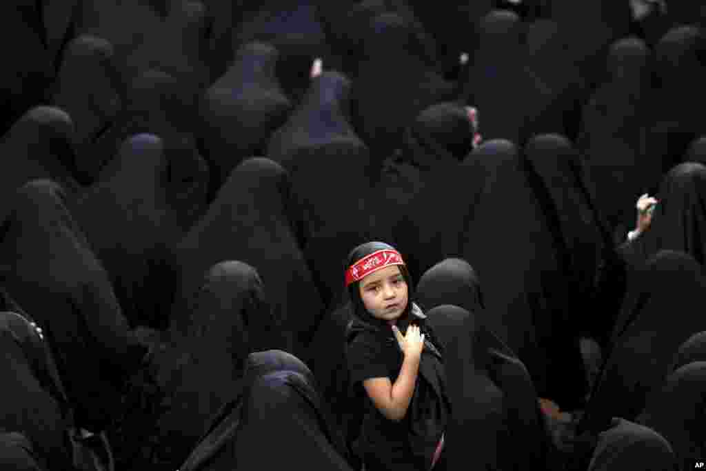 Muslim Shi&#39;ite women attend a mourning ceremony five days ahead of Ashoura, at the Sadat Akhavi Mosque in Tehran, Iran.