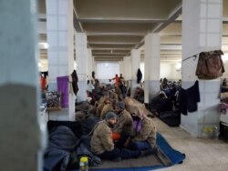 After Islamic State fell last year, men from all over the world were housed in prisons, pictured Feb. 16, 2020. Women and children were mostly brought to al-Hol Camp in Syria. (Heather Murdock/VOA)