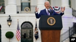 President Joe Biden speaks during an Independence Day celebration on the South Lawn of the White House, in Washington, July 4, 2021.