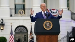 President Joe Biden speaks during an Independence Day celebration on the South Lawn of the White House, in Washington, July 4, 2021.