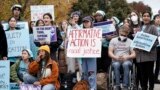 FILE - Activists demonstrate as the Supreme Court hears oral arguments on a pair of cases that could decide the future of affirmative action in college admissions, in Washington, Oct. 31, 2022. (AP Photo/J. Scott Applewhite, File)