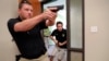 Trainees Chris Graves, left, and Bryan Hetherington, right, participate in a security training session at Fellowship of the Parks campus in Haslet, Texas, July 21, 2019.