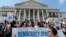 Demonstrators stage a sit-in at the Capitol in Washington, urging lawmakers to take money out of the political process, April 11, 2016.