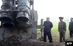 지난 2019년 11월 북한이 초대형방사포 시험사격을 실시했다며 공개한 사진.