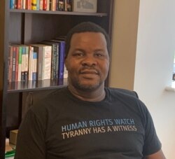 Dewa Mavhinga, pictured in Harare in December 2020, head of Human Rights Watch in southern Africa, fears Zimbabwe's tighter enforcement of COVID-19 lockdown regulations will be an excuse to crack down on government critics. (Columbus Mavhunga/VOA)