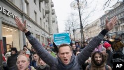 FILE - In this Sunday, Jan. 28, 2018, file photo, Russian opposition leader Alexei Navalny, center, attends a rally in Moscow, Russia. Navalny, who is President Vladimir Putin's biggest political foe, has been in prison for various offenses since 2021.