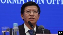 FILE - Wu Yanhua, deputy director of the national space agency, speaks during a press conference held in Beijing, China, Jan. 14, 2019.