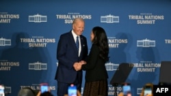 U.S. President Joe Biden is greeted by Interior Secretary Deb Haaland before he delivers remarks at a Tribal Nations Summit at the Department of the Interior in Washington, D.C., on Dec. 9, 2024.