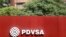 FILE - The corporate logo of the state oil company PDVSA is seen at a gas station in Caracas, Venezuela, Nov. 16, 2017.
