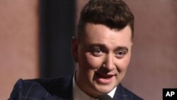 Sam Smith accepts the award for record of the year for “Stay With Me” at the 57th annual Grammy Awards, Feb 8, 2015 