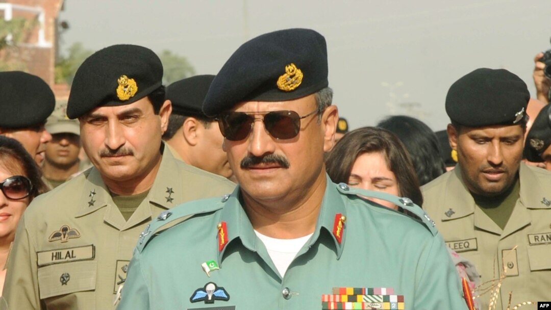 FILE - Major General Rizwan Akhtar arrives for a meeting, at the India-Pakistan Wagah Border Post, July 1, 2012.