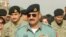 FILE - Major General Rizwan Akhtar arrives for a meeting, at the India-Pakistan Wagah Border Post, July 1, 2012.