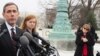 Plaintiff Abigail Fisher (2-L) is seen with conservative advocate Edward Blum (L) outside the U.S. Supreme Court in Washington, D.C., Dec. 9, 2015. (A. Scott/VOA)