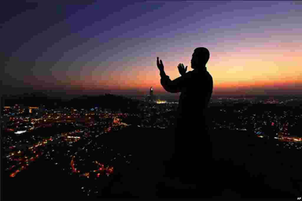 A Muslim pilgrim prayed at the top of Jabal al-Noor, Mountain of Light, on the outskirts, of Mecca, Saudi Arabia.